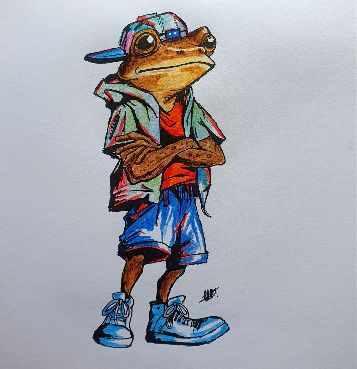Frog with arms crossed in a snapback